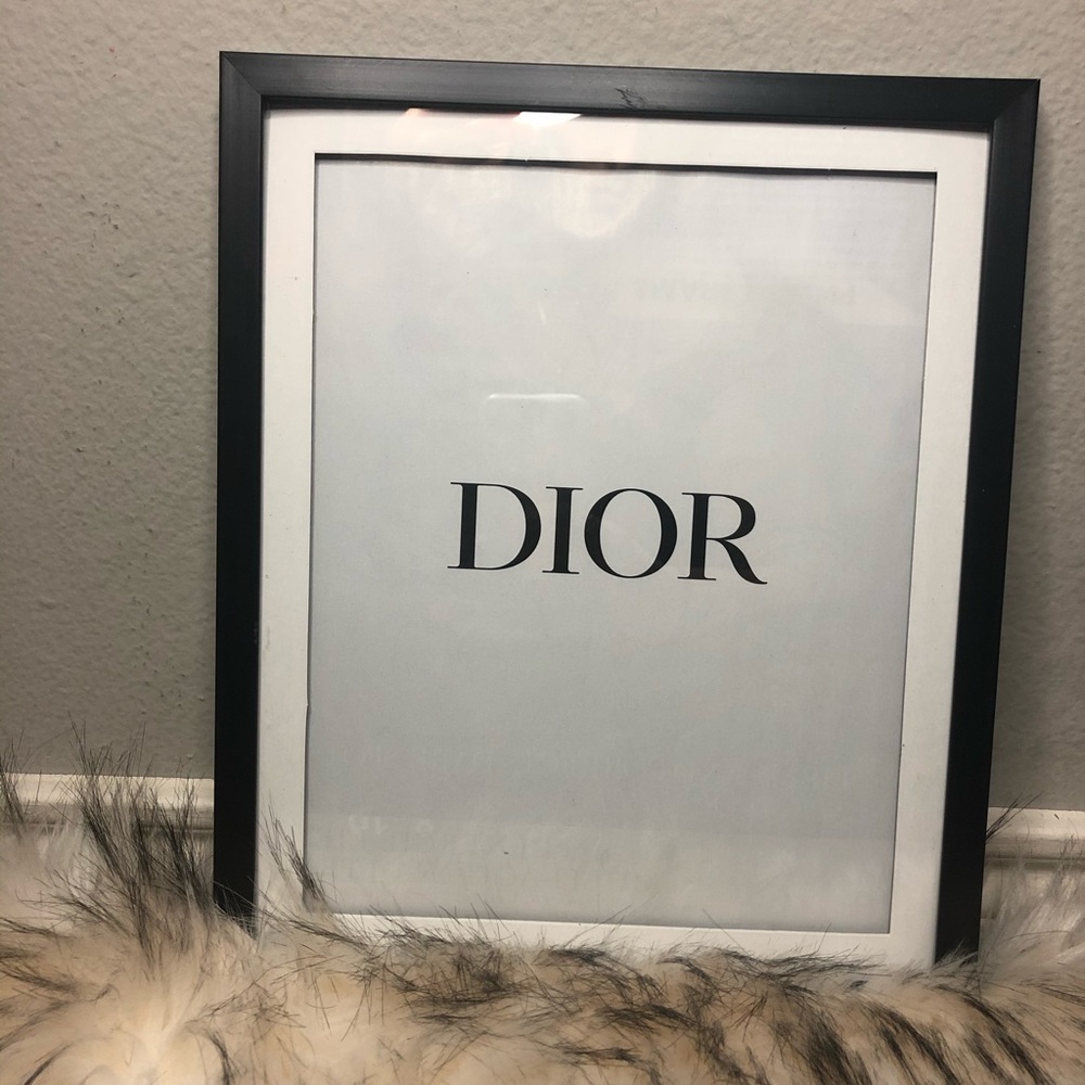 2 separate Dior wall photos
